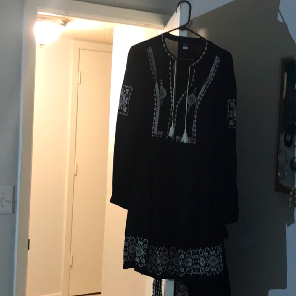 Womens V neck dress with intricate details